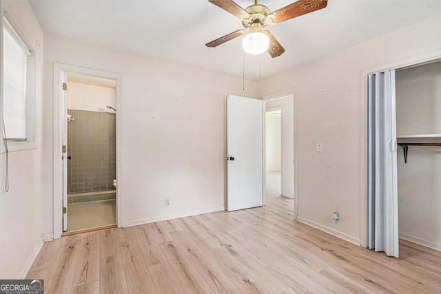 2954 Ann Marie Ln, Rex, GA 30273 - unfurnished bedroom with wood finished floors, ensuite bathroom, a closet, and ceiling fan
