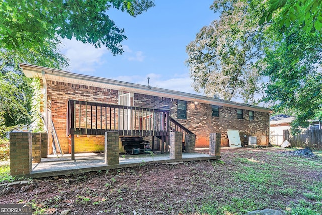 2954 Ann Marie Ln, Rex, GA 30273 - back of house with brick siding and a deck