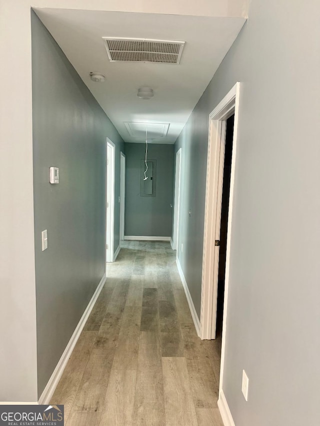 201 Deerfield Ln, Carrollton, GA 30116 - corridor with attic access and wood finished floors