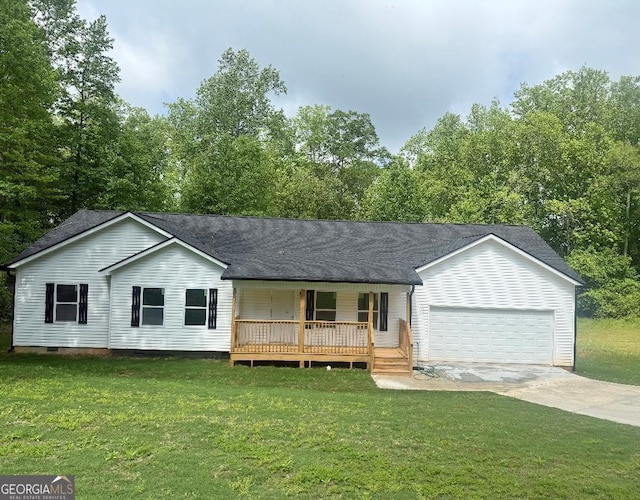 view of front of property with a porch, a front lawn, an attached garage, and concrete driveway