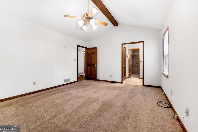 unfurnished bedroom with light colored carpet, baseboards, connected bathroom, and ceiling fan