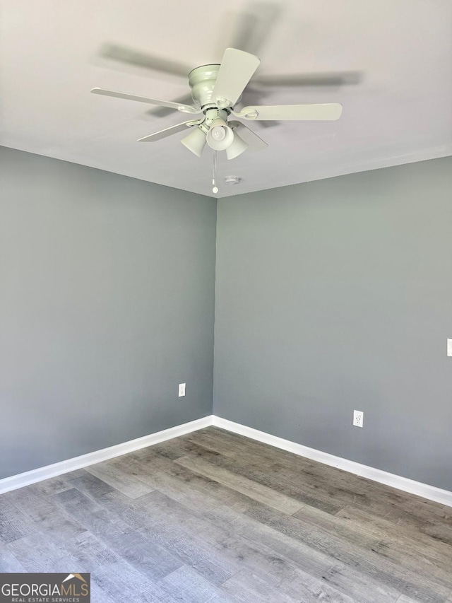 191 Deerfield Ln, Carrollton, GA 30116 - empty room with a ceiling fan, wood finished floors, and a smoke detector