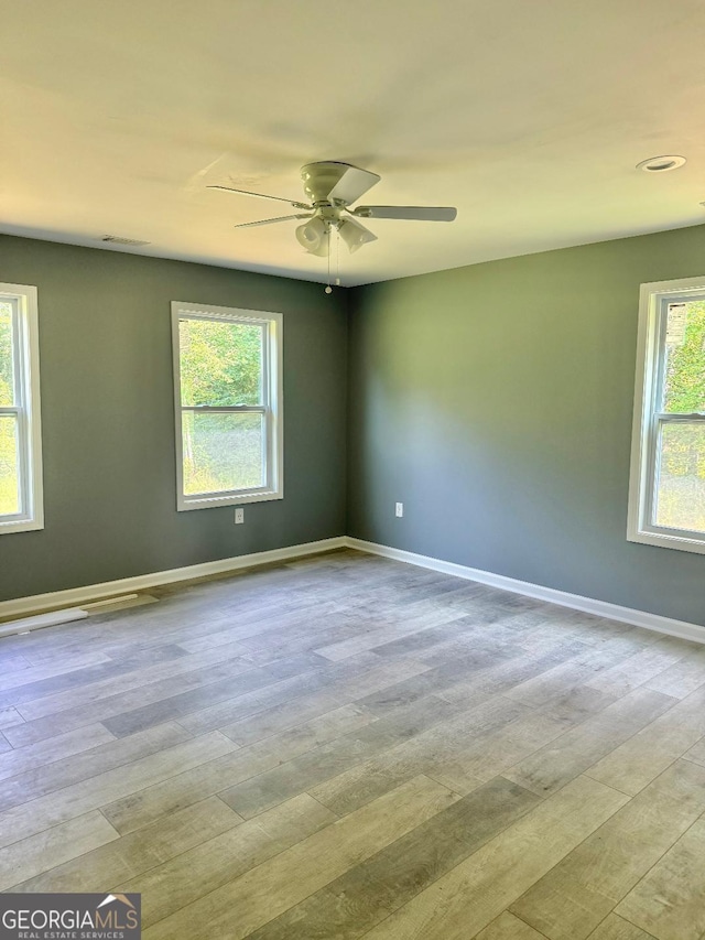 191 Deerfield Ln, Carrollton, GA 30116 - empty room featuring wood finished floors, ceiling fan, and recessed lighting