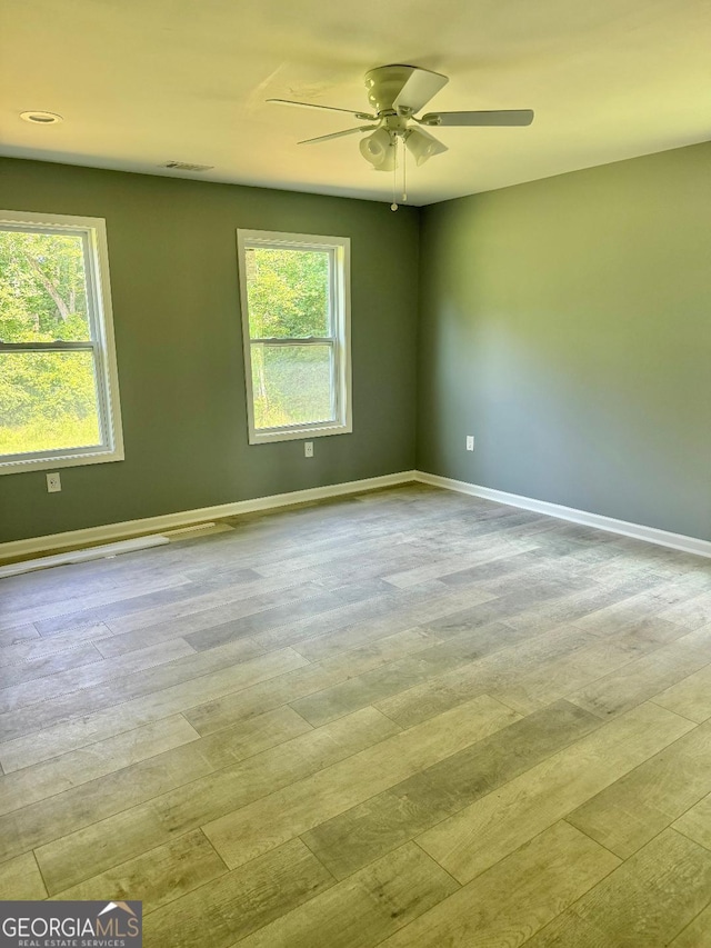191 Deerfield Ln, Carrollton, GA 30116 - spare room featuring ceiling fan and baseboards