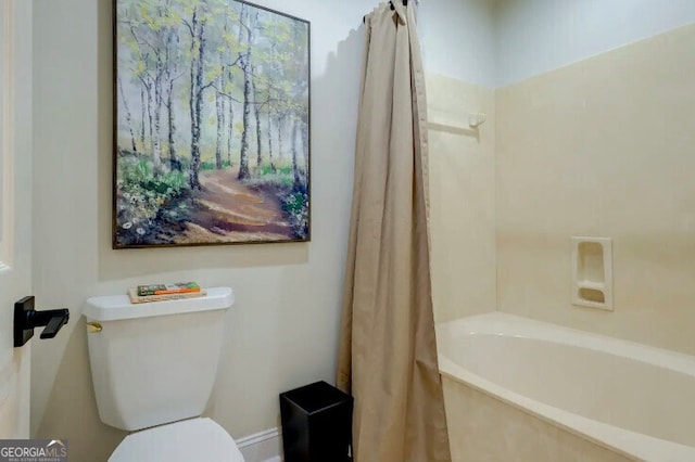 full bathroom with toilet and shower / bath combo