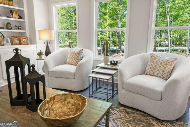 2749 Porches Ln, Dacula, GA 30019 - living area featuring dark wood finished floors and built in features