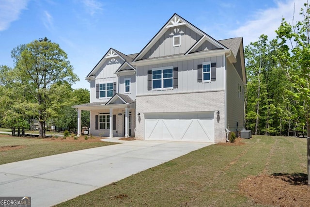 craftsman-style house featuring board and batten siding, concrete driveway, brick siding, a garage, and central AC