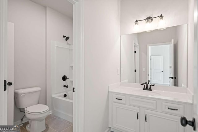 full bathroom with tile patterned flooring, toilet, vanity,  shower combination, and baseboards
