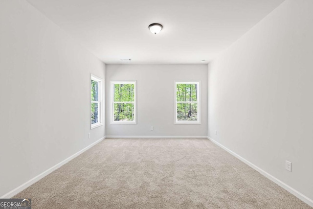 2749 Porches Ln, Dacula, GA 30019 - carpeted empty room featuring baseboards