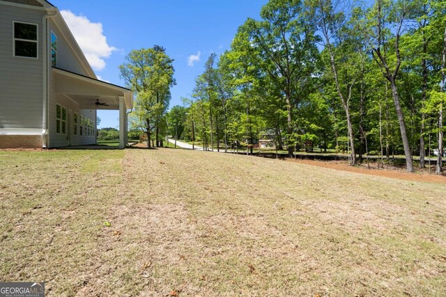 2749 Porches Ln, Dacula, GA 30019 - view of grassy yard featuring ceiling fan