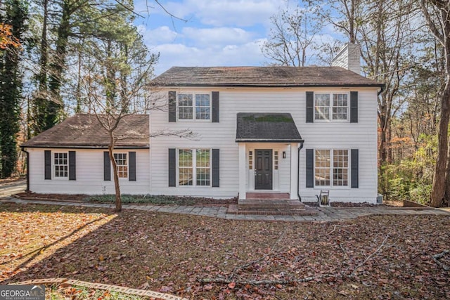 7935 Sweetwater Dr, Douglasville, GA 30135 - colonial home with a chimney