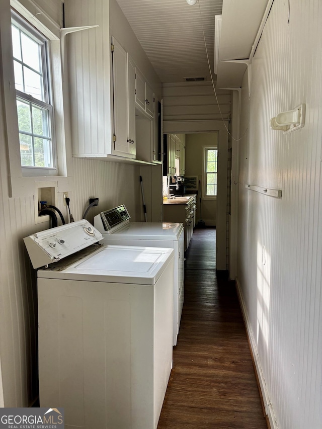 151 W Ellawood Ave, Cedartown, GA 30125 - laundry room with washer and dryer, dark wood finished floors, and cabinet space