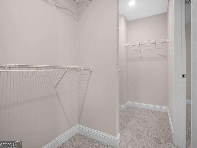 733 Springhill Dr, Gray, GA 31032 - spacious closet with carpet flooring