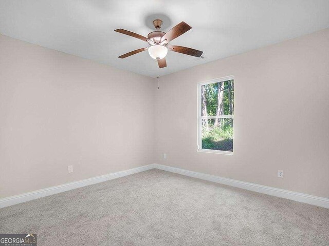 733 Springhill Dr, Gray, GA 31032 - carpeted empty room with ceiling fan and baseboards