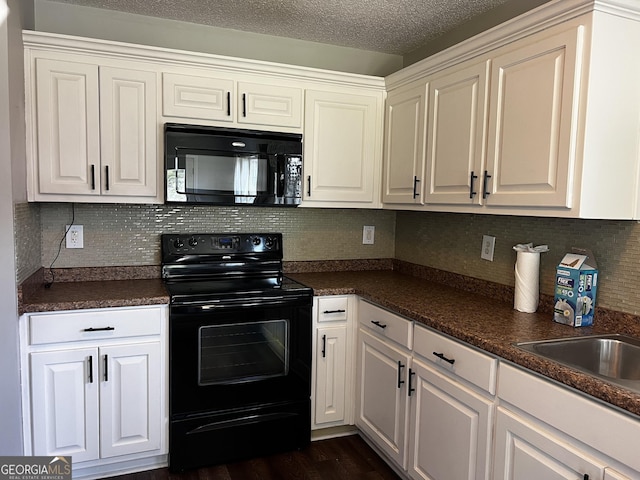 120 Magnolia Trl, Milner, GA 30257 - kitchen featuring black appliances, dark countertops, white cabinets, backsplash, and dark wood-style floors