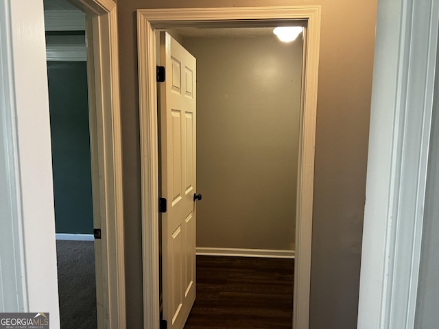 120 Magnolia Trl, Milner, GA 30257 - corridor with baseboards and dark wood finished floors