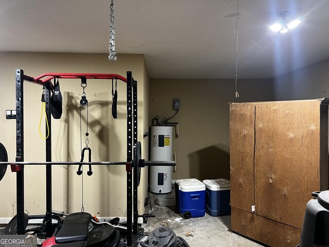 120 Magnolia Trl, Milner, GA 30257 - detailed view of electric water heater and concrete flooring