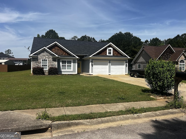 120 Magnolia Trl, Milner, GA 30257 - view of front facade featuring a front yard, an attached garage, driveway, stone siding, and a shingled roof