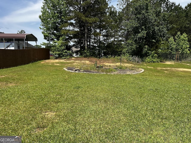 120 Magnolia Trl, Milner, GA 30257 - view of yard featuring a detached carport