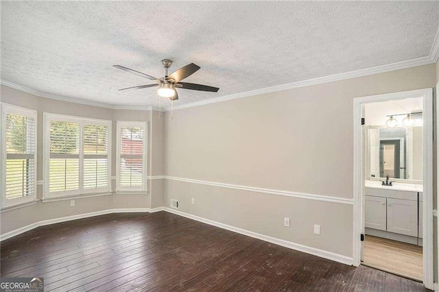 4902 Cedar Ct SE, Conyers, GA 30094 - empty room with a ceiling fan, dark wood-style flooring, a textured ceiling, a sink, and baseboards