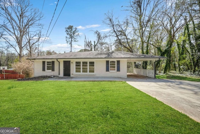 2703 Flagstone Dr SE, Atlanta, GA 30316 - ranch-style home featuring concrete driveway, a carport, and stucco siding