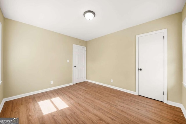 2703 Flagstone Dr SE, Atlanta, GA 30316 - unfurnished room with wood finished floors and baseboards