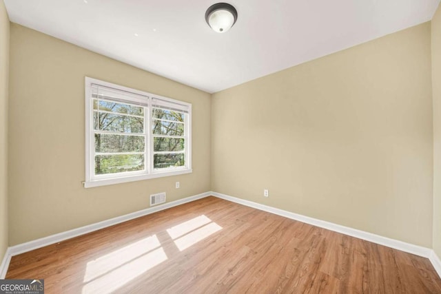 2703 Flagstone Dr SE, Atlanta, GA 30316 - empty room featuring light wood finished floors and baseboards