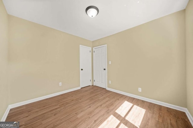 2703 Flagstone Dr SE, Atlanta, GA 30316 - unfurnished room featuring wood finished floors and baseboards