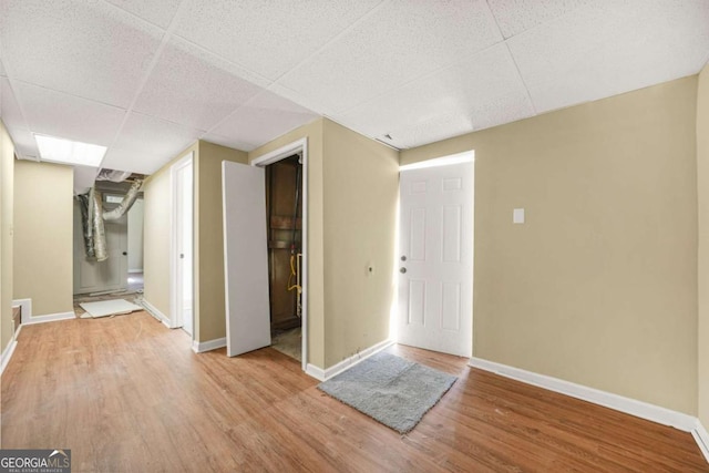 2703 Flagstone Dr SE, Atlanta, GA 30316 - entrance foyer featuring light wood-style flooring and a paneled ceiling