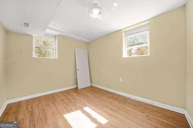 2703 Flagstone Dr SE, Atlanta, GA 30316 - basement with wood finished floors and baseboards