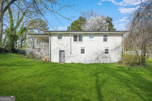 2703 Flagstone Dr SE, Atlanta, GA 30316 - back of house featuring a yard and stairway
