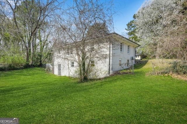2703 Flagstone Dr SE, Atlanta, GA 30316 - view of side of property with a lawn