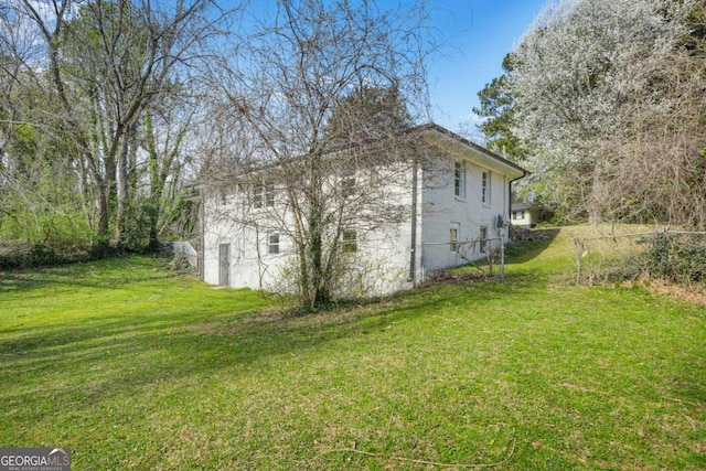 2703 Flagstone Dr SE, Atlanta, GA 30316 - view of property exterior with a lawn