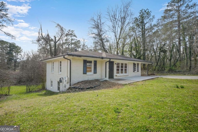 2703 Flagstone Dr SE, Atlanta, GA 30316 - view of front of home featuring a patio area and brick siding