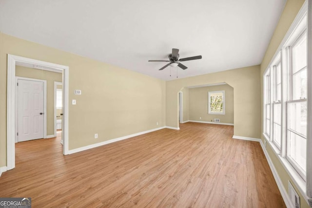 2703 Flagstone Dr SE, Atlanta, GA 30316 - unfurnished room featuring a ceiling fan and light wood-style floors