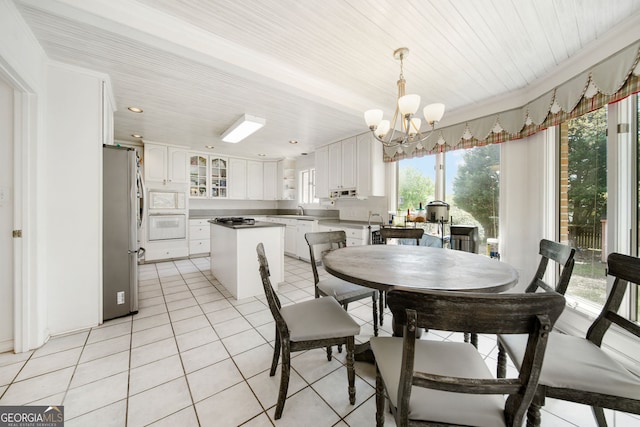 104 Bob White Run, Jackson, GA 30233 - dining space with a chandelier and light tile patterned flooring