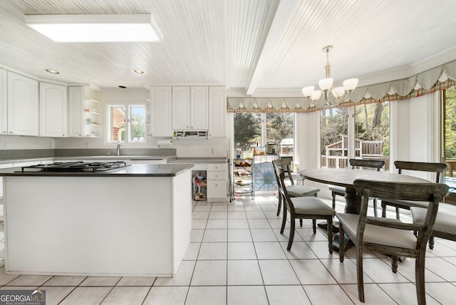 104 Bob White Run, Jackson, GA 30233 - kitchen with a chandelier, white cabinets, light tile patterned floors, decorative light fixtures, and wood ceiling