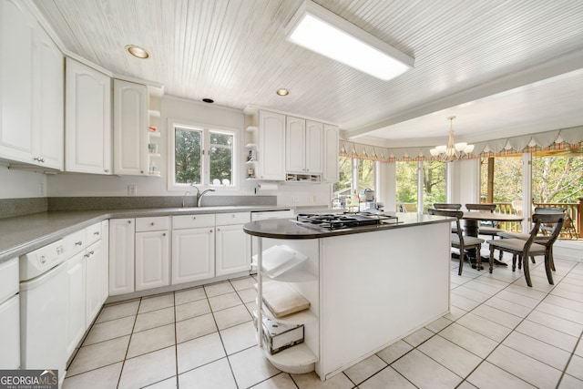 104 Bob White Run, Jackson, GA 30233 - kitchen featuring open shelves, gas cooktop, white dishwasher, a chandelier, and recessed lighting