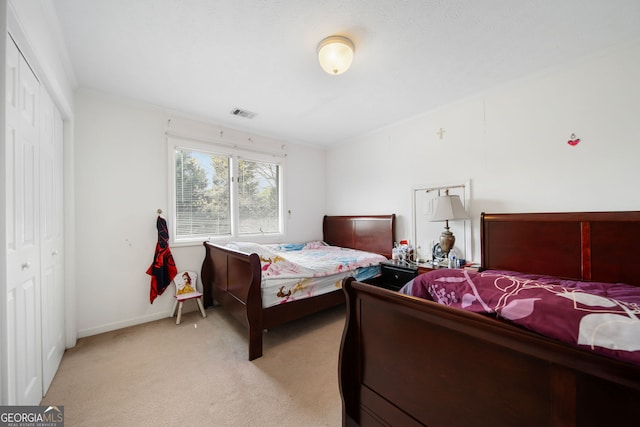 104 Bob White Run, Jackson, GA 30233 - bedroom with light colored carpet, a closet, and baseboards