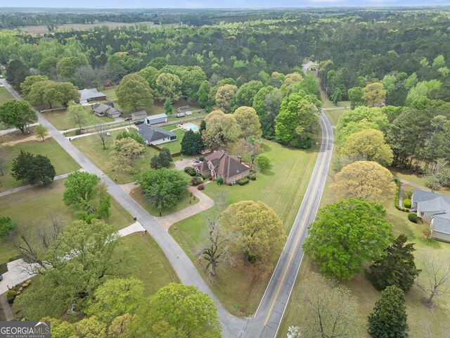 104 Bob White Run, Jackson, GA 30233 - aerial view of property and surrounding area featuring a heavily wooded area