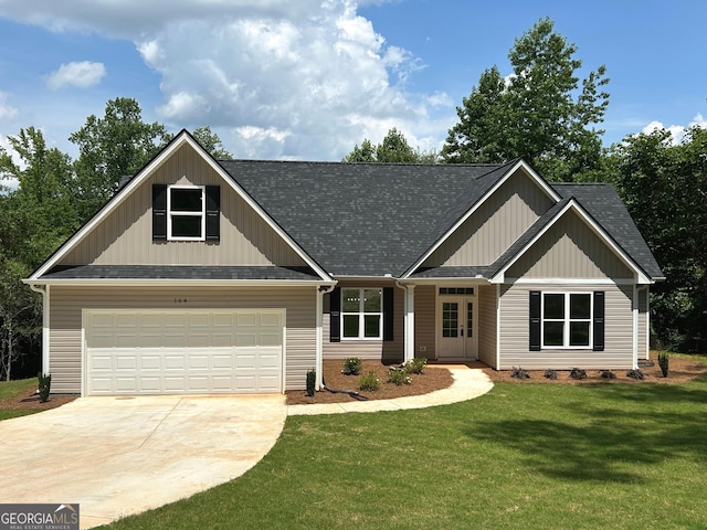 164 David Elder Rd, Griffin, GA 30223 - craftsman-style house featuring driveway, a front yard, a shingled roof, and board and batten siding