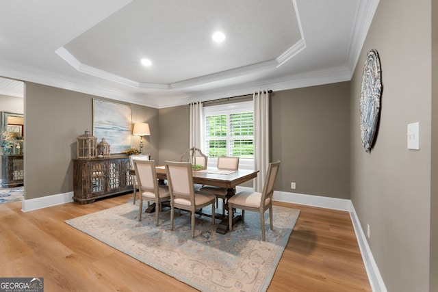 130 Allie Dr, Mcdonough, GA 30252 - dining area with a tray ceiling, light wood finished floors, crown molding, baseboards, and recessed lighting