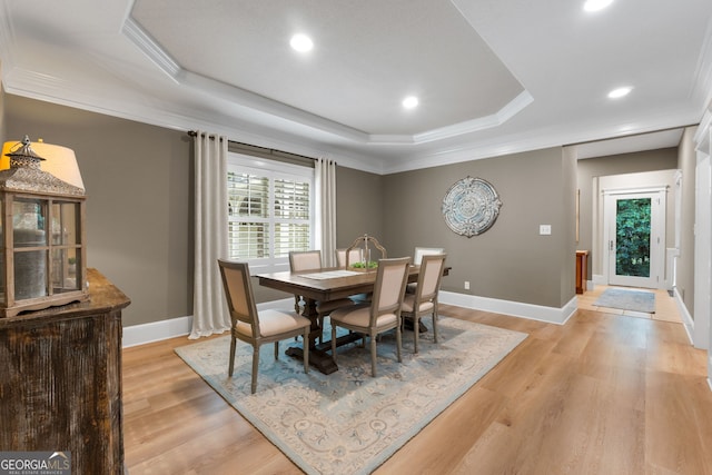 130 Allie Dr, Mcdonough, GA 30252 - dining room featuring a tray ceiling, ornamental molding, baseboards, light wood-type flooring, and recessed lighting