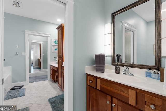 130 Allie Dr, Mcdonough, GA 30252 - bathroom with vanity, a bath, and tile patterned floors