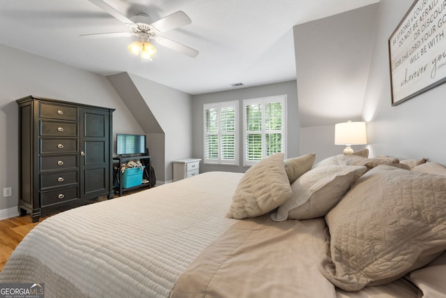 130 Allie Dr, Mcdonough, GA 30252 - bedroom with light wood-style floors, ceiling fan, and baseboards