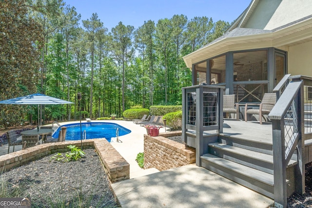 130 Allie Dr, Mcdonough, GA 30252 - outdoor pool featuring a patio area and a sunroom
