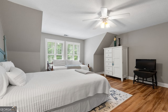 130 Allie Dr, Mcdonough, GA 30252 - bedroom with light wood finished floors, a ceiling fan, and baseboards