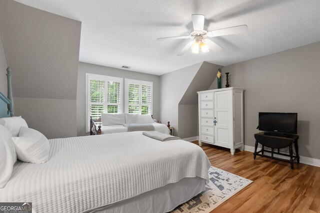 130 Allie Dr, Mcdonough, GA 30252 - bedroom with light wood finished floors, a ceiling fan, and baseboards