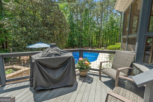 130 Allie Dr, Mcdonough, GA 30252 - wooden deck featuring an outdoor pool