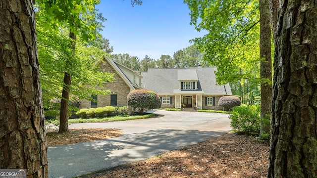 130 Allie Dr, Mcdonough, GA 30252 - view of front facade with stone siding and concrete driveway